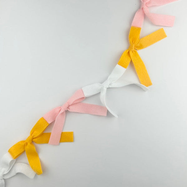 Bow Bunting (white, marigold, light pink) - Eventide Pennant Co.