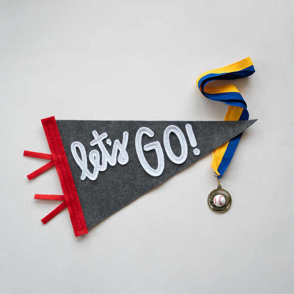 Motivational banner with 'let's GO!' text and colorful ribbons on a light gray background