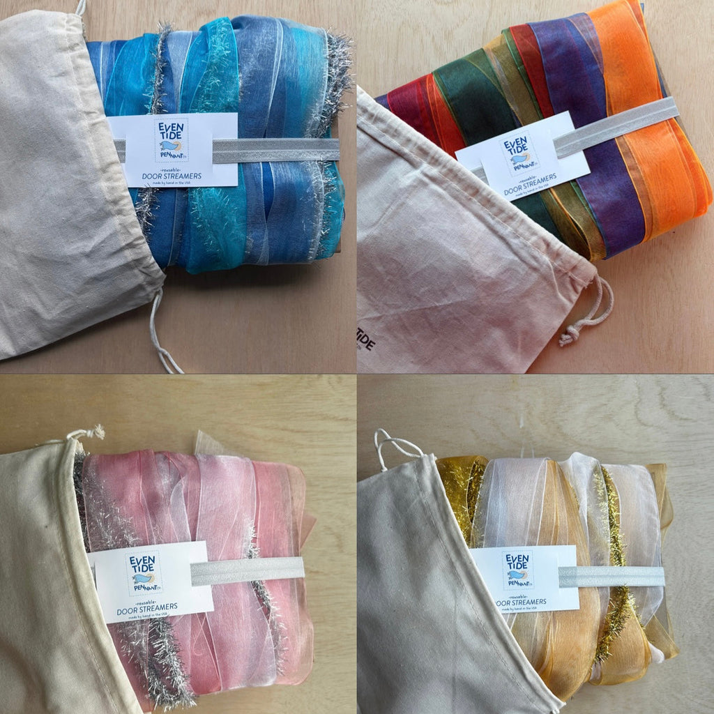 Four folded fabric swatches in different colors with visible brand labels on a wooden surface.